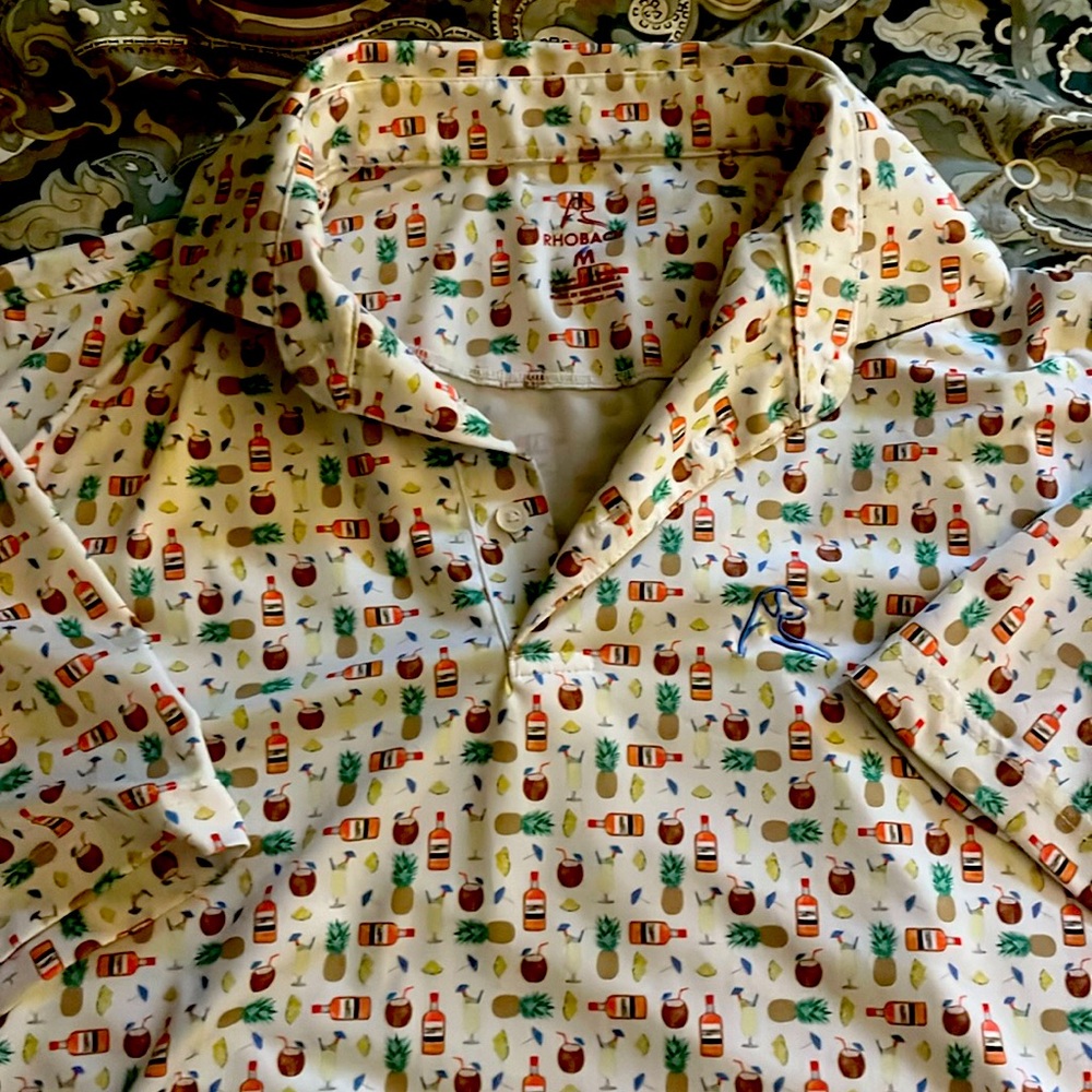 Rhoback size medium polo. Pina colada!